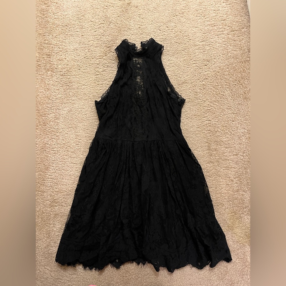 Free people lace black dress, size 4, never worn.